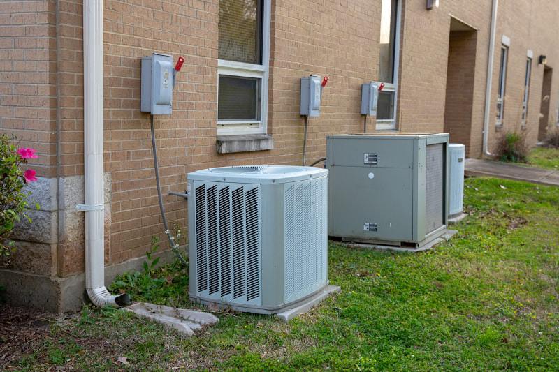 Why Your AC Should Sit Level in Buford, GA