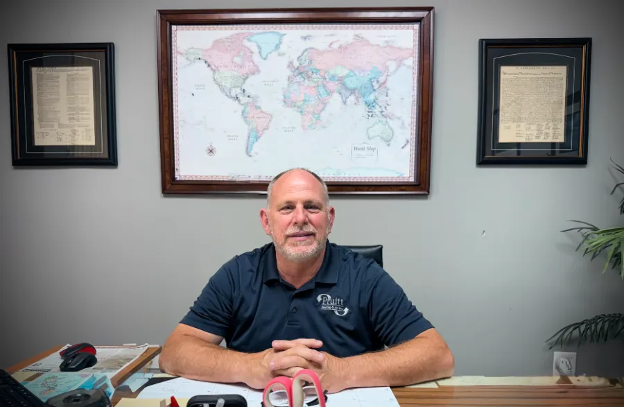 owner at desk in office